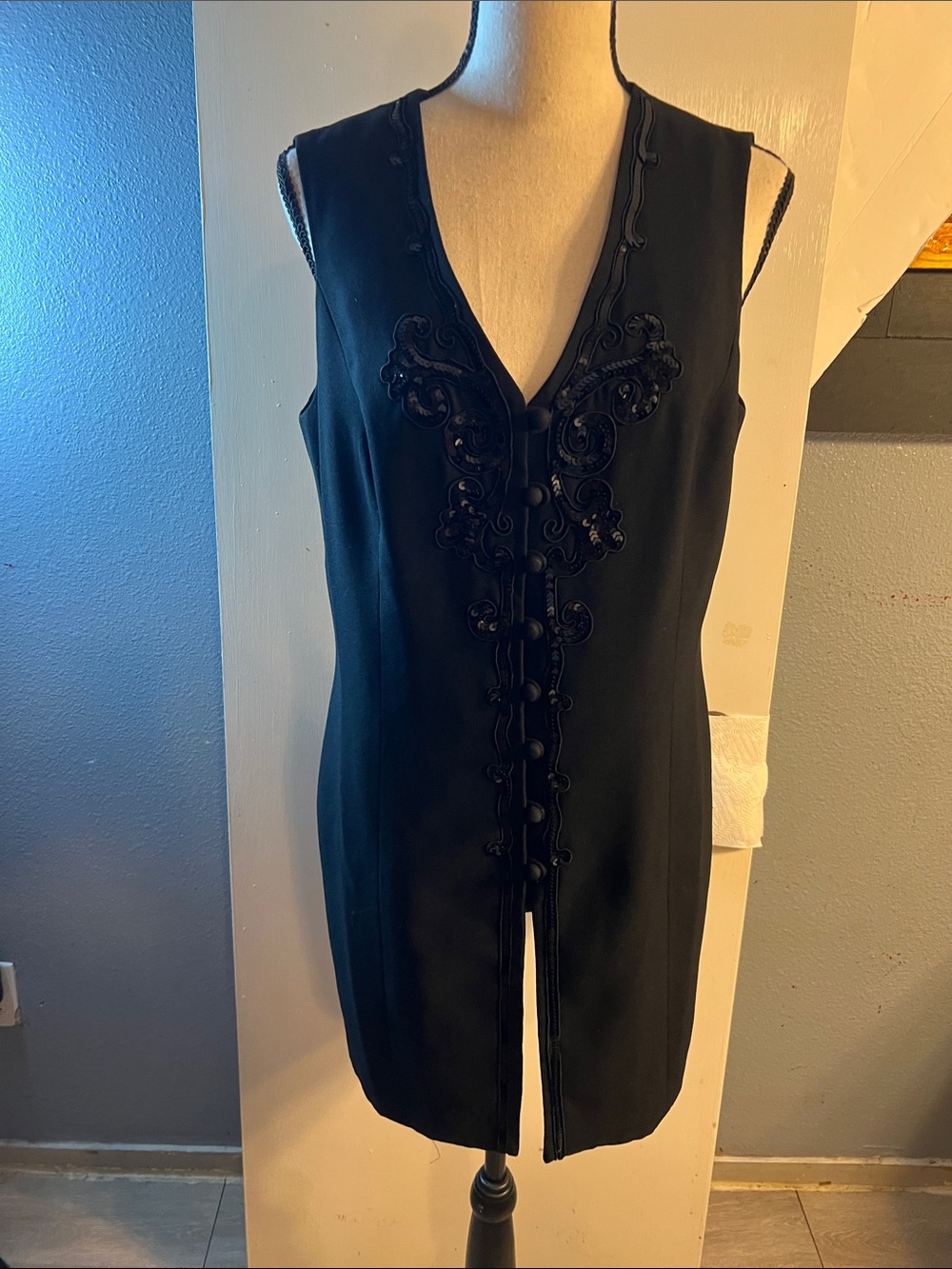 Black Sleeveless V-Neck Tunic with Decorative Trim